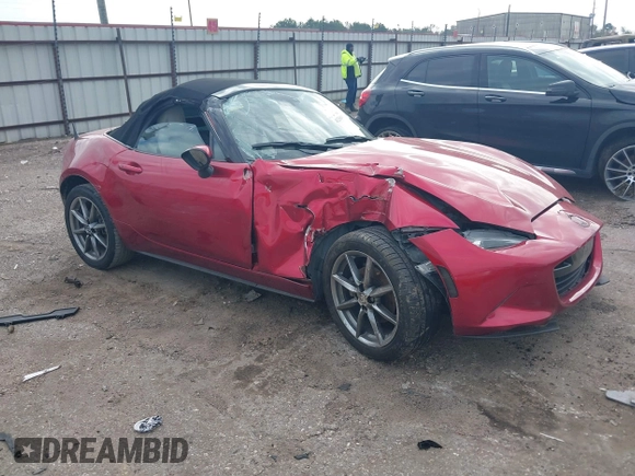 2021 Mazda MX-5 Miata Grand Touring with VIN JM1NDAD79M0454079, listed as a IAAI auction lot 41230199 with 104,783 mi miles and . Bid and sale history available at DreamBid. Image 13.