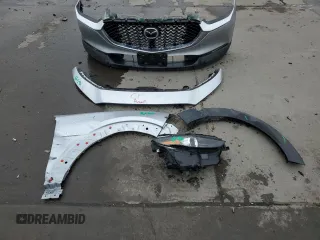 2021 Mazda CX-30 Preferred с VIN 3MVDMBCL5MM248575, выставлен на аукционе Copart как лот 52821575 с пробегом 47 364 миль миль и Списание • Salvage title. История ставок и продаж доступна на DreamBid. Изображение 13.