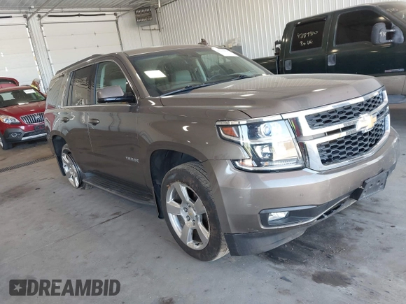 2016 Chevrolet Tahoe LT with VIN 1GNSKBKC9GR172076, listed as a IAAI auction lot 42223918 with 92,348 mi miles and . Bid and sale history available at DreamBid. Image 1.