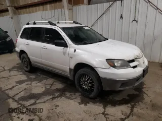 2004 Mitsubishi Outlander LS with VIN JA4LZ31F54U002164, listed as a Copart auction lot 86822794 with 267,669 mi miles and Salvage Title. Bid and sale history available at carsss.com. Image 4.