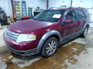 2008 Ford Taurus X SEL with VIN 1FMDK05W98GA37104, listed as a IAAI auction lot 42123902 with 166,739 mi miles and . Bid and sale history available at DreamBid. Image 2.