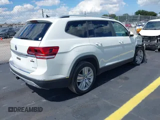 2019 Volkswagen Atlas SEL with VIN 1V2MR2CA7KC557754, listed as a IAAI auction lot 42264080 with 20,412 mi miles and . Bid and sale history available at DreamBid. Image 4.