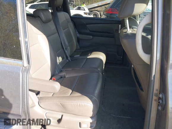 2015 Honda Odyssey Touring Elite with VIN 5FNRL5H99FB094727, listed as a IAAI auction lot 42001288 with 254,015 mi miles and . Bid and sale history available at DreamBid. Image 8.