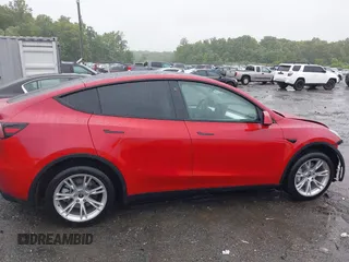 2023 Tesla Model Y Long Range with VIN 7SAYGDEE5PA111262, listed as a IAAI auction lot 42341148 with 19,014 mi miles and . Bid and sale history available at DreamBid. Image 13.