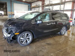 2021 Honda Odyssey Touring z VIN 5FNRL6H84MB009125, wystawiony jako Copart lot #58248385 z przebiegiem 55 360 mil mil oraz Szkoda całkowita • Salvage title. Historia ofert i sprzedaży dostępna na DreamBid. Obrazek 1.