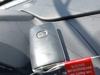 2023 Mazda MX-5 Miata Grand Touring с VIN JM1NDAM71P0560062, выставлен на аукционе IAAI как лот 42065123 с пробегом 11 320 миль миль и . История ставок и продаж доступна на DreamBid. Изображение 11.