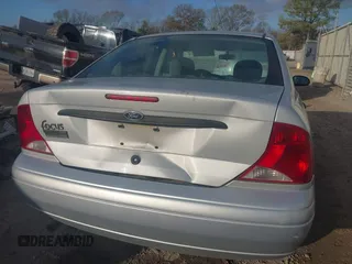 2001 Ford Focus LX with VIN 1FAFP33P21W309425, listed as a IAAI auction lot 41482071 with 86,943 mi miles and . Bid and sale history available at carsss.com. Image 6.