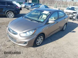 2012 Hyundai Accent GLS with VIN KMHCT4AE3CU114931, listed as a IAAI auction lot 41751304 with 166,831 mi miles. Bid and sale history available at carsss.com. Image 2.