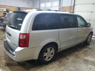 2010 Dodge Grand Caravan Crew with VIN 2D4RN6DX9AR390514, listed as a Copart auction lot 50906305 with 102,729 mi miles and Clean Title. Bid and sale history available at DreamBid. Image 3.