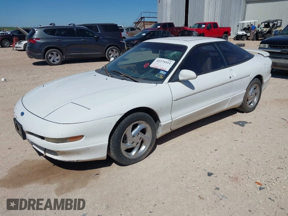 1996 Ford Probe z VIN 1ZVLT22B0T5127219, wystawiony jako IAAI lot #42279311 z przebiegiem 123 290 mil mil oraz . Historia ofert i sprzedaży dostępna na DreamBid. Obrazek 2.