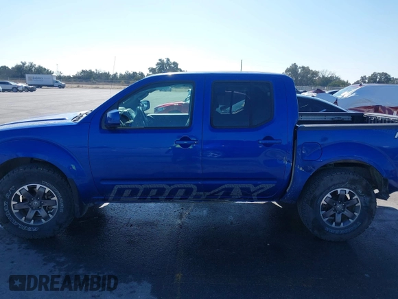 2014 Nissan Frontier SV with VIN 1N6AD0EV4EN720325, listed as a IAAI auction lot 41479133 with 61,661 mi miles and . Bid and sale history available at DreamBid. Image 14.