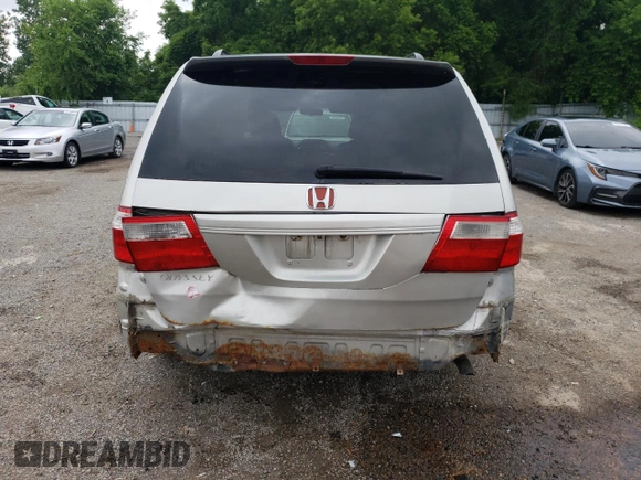 2007 Honda Odyssey EX with VIN 5FNRL38427B513477, listed as a Copart auction lot 62457695 with 216,977 mi miles and Salvage title. Bid and sale history available at DreamBid. Image 6.
