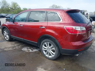 2011 Mazda CX-9 Grand Touring z VIN JM3TB2DA6B0310296, wystawiony jako IAAI lot #42022744 z przebiegiem 163 889 mil mil oraz . Historia ofert i sprzedaży dostępna na DreamBid. Obrazek 3.