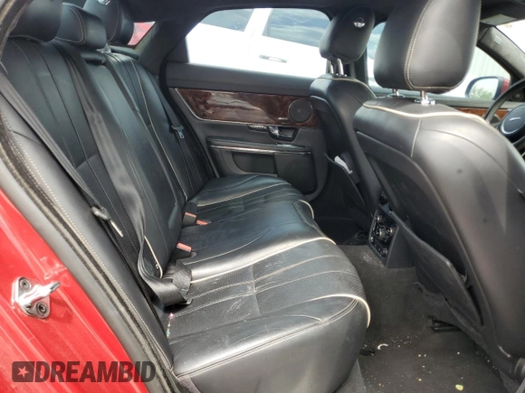 2013 Jaguar XJ with VIN SAJWJ1CD9D8V48888, listed as a Copart auction lot 62272685 with 166,533 mi miles and Clean title. Bid and sale history available at DreamBid. Image 10.