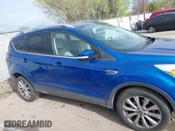 2017 Ford Escape Titanium with VIN 1FMCU0JD1HUA30076, listed as a IAAI auction lot 42024777 with 110,467 mi miles. Bid and sale history available at carsss.com. Image 13.
