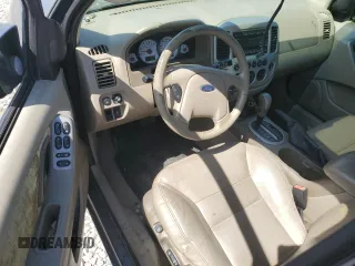 2005 Ford Escape Limited with VIN 1FMYU94175KB94533, listed as a Copart auction lot 71092124 with 156,992 mi miles and Salvage Title. Bid and sale history available at carsss.com. Image 8.