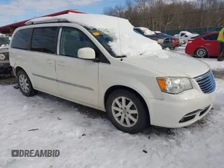 2013 Chrysler Town & Country Touring with VIN 2C4RC1BG6DR720204, listed as a IAAI auction lot 41292793 with 190,154 mi miles and . Bid and sale history available at DreamBid. Image 1.