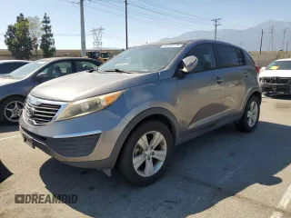 2012 Kia Sportage LX z VIN KNDPB3A22C7286908, wystawiony jako Copart lot #58220115 z przebiegiem 171 114 mil mil oraz Czysty tytuł • Clean title. Historia ofert i sprzedaży dostępna na DreamBid. Obrazek 1.