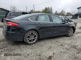 2020 Ford Fusion Titanium with VIN 3FA6P0RU5LR141328, listed as a Copart auction lot 55718165 with 94,536 mi miles and Non repairable. Bid and sale history available at DreamBid. Image 3.