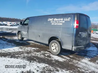 2014 Chevrolet Express Cargo Van with VIN 1GCWGGBA5E1205786, listed as a IAAI auction lot 41339085 with 201,460 mi miles. Bid and sale history available at carsss.com. Image 3.