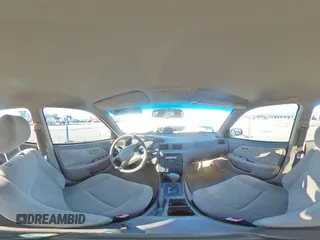 2000 Toyota Camry CE z VIN 4T1BG22K7YU738912, wystawiony jako Copart lot #88852845 z przebiegiem 122 569 mil mil oraz Szkoda całkowita • Salvage title. Historia ofert i sprzedaży dostępna na DreamBid. Obrazek 13.