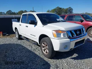 2012 Nissan Titan SV with VIN 1N6BA0ED2CN302119, listed as a IAAI auction lot 41586455 with 294,824 mi miles. Bid and sale history available at carsss.com. Image 1.