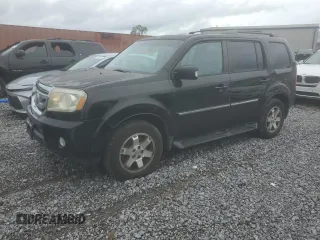 2011 Honda Pilot Touring z VIN 5FNYF4H96BB096278, wystawiony jako Copart lot #54597735 z przebiegiem 215 781 mil mil oraz Czysty tytuł • Clean title. Historia ofert i sprzedaży dostępna na DreamBid. Obrazek 1.
