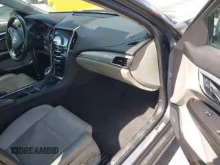 2014 Cadillac ATS Luxury RWD z VIN 1G6AB5RAXE0142079, wystawiony jako IAAI lot #42517963 z przebiegiem 140 118 mil mil oraz . Historia ofert i sprzedaży dostępna na DreamBid. Obrazek 5.