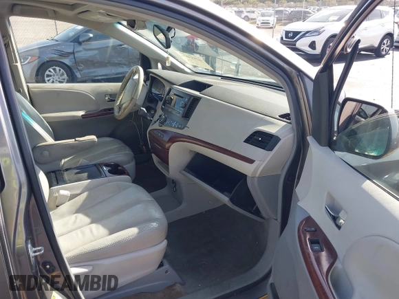 2011 Toyota Sienna XLE AAS with VIN 5TDYK3DC9BS117594, listed as a IAAI auction lot 42553026 with 156,808 mi miles and . Bid and sale history available at DreamBid. Image 5.