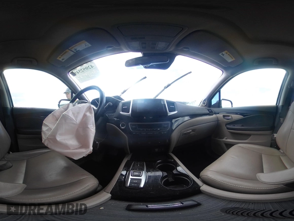 2017 Honda Pilot Touring with VIN 5FNYF6H9XHB034001, listed as a IAAI auction lot 42092549 with 142,422 mi miles and . Bid and sale history available at DreamBid. Image 18.