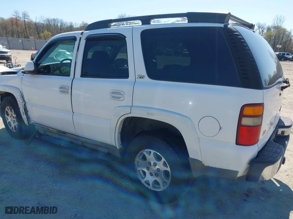 2003 Chevrolet Tahoe Z71 with VIN 1GNEK13Z63R228530, listed as a IAAI auction lot 41996750 with 220,916 mi miles. Bid and sale history available at carsss.com. Image 3.