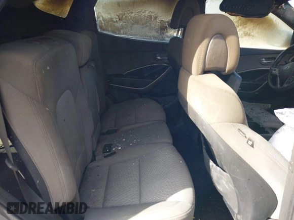 2016 Hyundai Santa Fe z VIN 5XYZTDLB7GG326076, wystawiony jako IAAI lot #41435551 z przebiegiem Nie podano mil oraz . Historia ofert i sprzedaży dostępna na DreamBid. Obrazek 8.