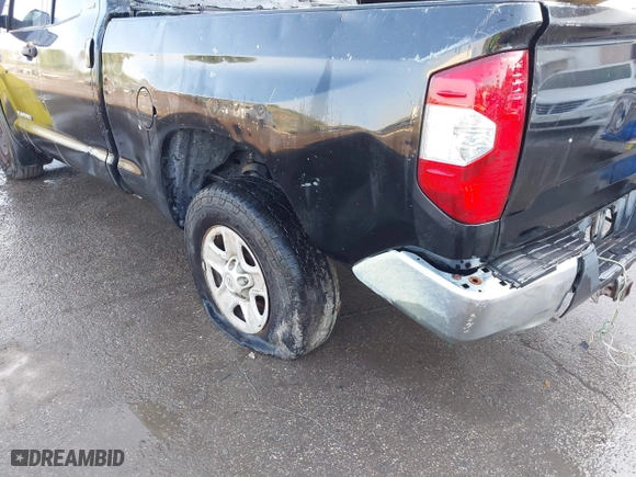 2014 Toyota Tundra 4WD Truck SR with VIN 5TFUW5F1XEX377799, listed as a IAAI auction lot 41889381 with 225,551 mi miles. Bid and sale history available at carsss.com. Image 6.