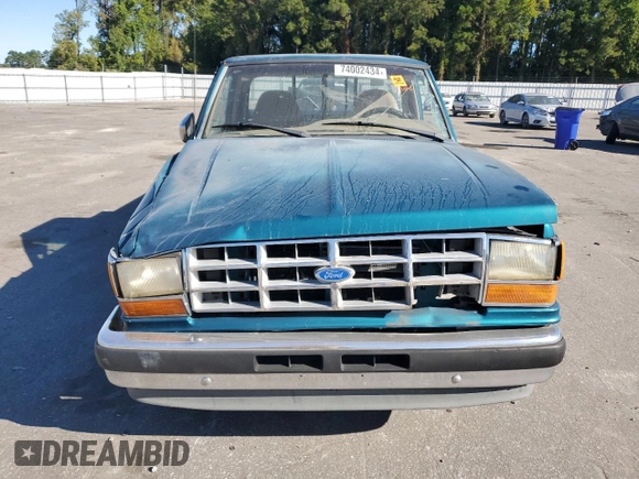 1992 Ford Ranger with VIN 1FTCR10A3NTA81065, listed as a Copart auction lot 74002434 with 9,827 mi miles and Salvage Title. Bid and sale history available at carsss.com. Image 5.