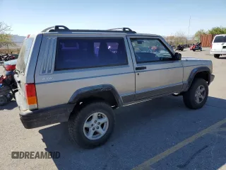 2000 Jeep Cherokee SE with VIN 1J4FF27SXYL140055, listed as a Copart auction lot 70315454 with 176,017 mi miles and Salvage title. Bid and sale history available at DreamBid. Image 3.