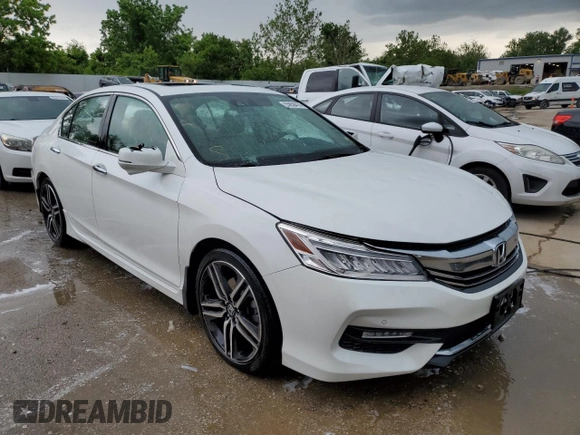 2017 Honda Accord Touring with VIN 1HGCR3F91HA009968, listed as a Copart auction lot 55858414 with 133,083 mi miles and Salvage title. Bid and sale history available at DreamBid. Image 4.