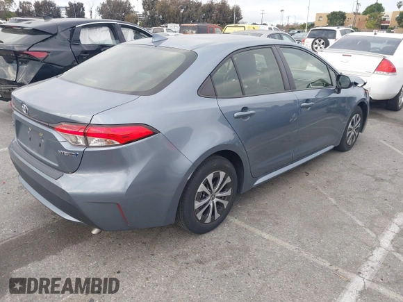 2022 Toyota Corolla Hybrid LE with VIN JTDEAMDE4NJ041913, listed as a IAAI auction lot 41883490 with 23,063 mi miles. Bid and sale history available at carsss.com. Image 4.