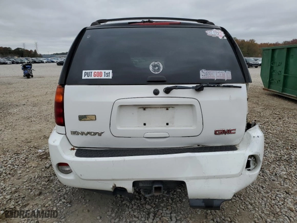 2005 GMC Envoy Denali with VIN 1GKET63M452384525, listed as a Copart auction lot 82117214 with 182,469 mi miles and Salvage Title. Bid and sale history available at carsss.com. Image 6.