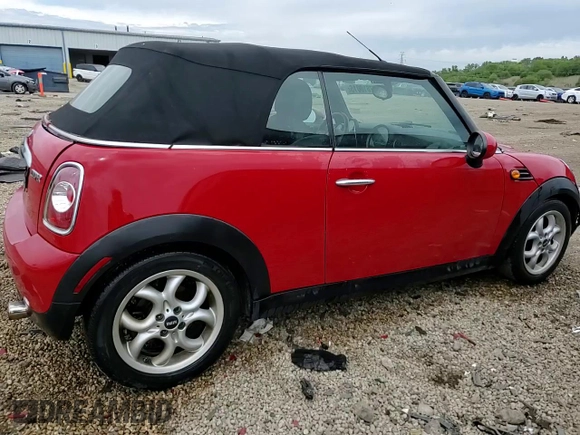 2012 MINI Convertible with VIN WMWZN3C58CT134224, listed as a Copart auction lot 57610015 with 141,394 mi miles and Salvage title. Bid and sale history available at DreamBid. Image 13.