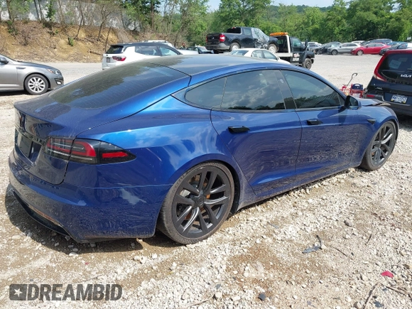 2022 Tesla Model S with VIN 5YJSA1E55NF486443, listed as a IAAI auction lot 42720110 with Not provided miles and . Bid and sale history available at DreamBid. Image 4.