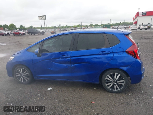 2018 Honda Fit EX with VIN 3HGGK5H88JM718508, listed as a IAAI auction lot 42181101 with 116,446 mi miles and . Bid and sale history available at DreamBid. Image 14.