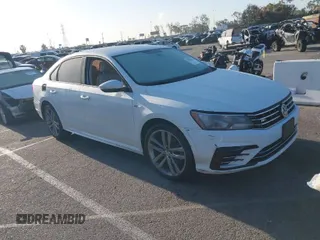 2018 Volkswagen Passat 2.0T S with VIN 1VWAA7A35JC009020, listed as a IAAI auction lot 41955626 with 99,900 mi miles. Bid and sale history available at carsss.com. Image 1.