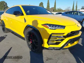 2019 Lamborghini Urus z VIN ZPBUA1ZL5KLA05951, wystawiony jako IAAI lot #41408137 z przebiegiem 48 113 mil mil oraz . Historia ofert i sprzedaży dostępna na DreamBid. Obrazek 1.