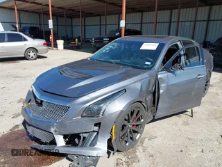 2018 Cadillac CTS-V z VIN 1G6A15S67J0148246, wystawiony jako IAAI lot #42083016 z przebiegiem 82 097 mil mil oraz . Historia ofert i sprzedaży dostępna na DreamBid. Obrazek 2.