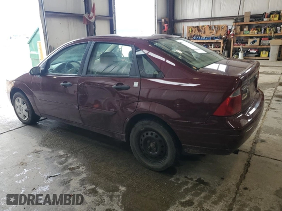 2007 Ford Focus S z VIN 1FAFP34N77W249390, wystawiony jako Copart lot #61817215 z przebiegiem 112 295 mil mil oraz Szkoda całkowita • Salvage title. Historia ofert i sprzedaży dostępna na DreamBid. Obrazek 2.