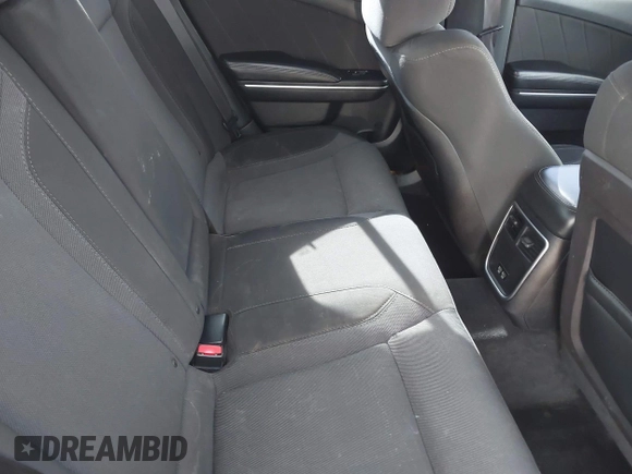 2015 Dodge Charger SXT with VIN 2C3CDXHG4FH890684, listed as a IAAI auction lot 41896958 with 118,140 mi miles and . Bid and sale history available at DreamBid. Image 8.
