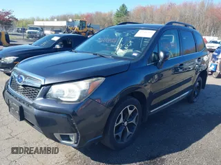2015 Subaru Forester 2.0XT Touring with VIN JF2SJGWCXFH514739, listed as a IAAI auction lot 42143364 with 107,359 mi miles. Bid and sale history available at carsss.com. Image 2.