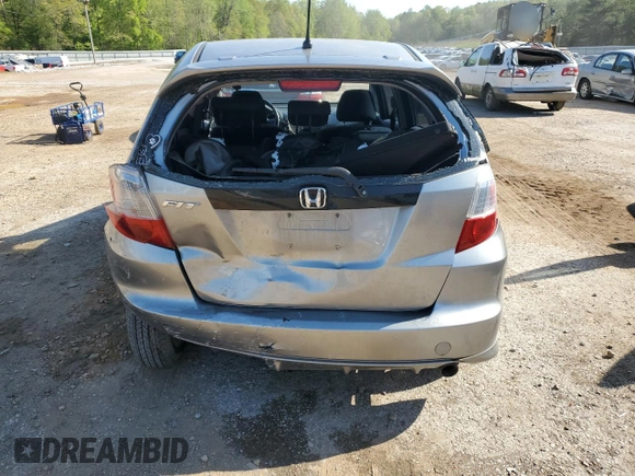 2009 Honda Fit Sport с VIN JHMGE88459S048194, выставлен на аукционе Copart как лот 52581055 с пробегом 177 290 миль миль и Списание • Salvage title. История ставок и продаж доступна на DreamBid. Изображение 6.