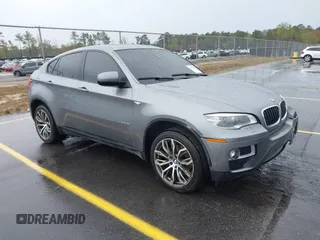 2014 BMW X6 xDrive35i with VIN 5UXFG2C53E0C45246, listed as a IAAI auction lot 41844763 with 212,612 mi miles. Bid and sale history available at carsss.com. Image 1.