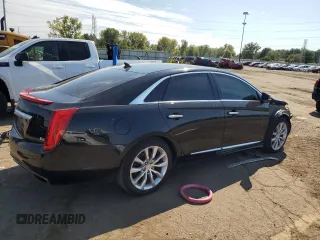 2013 Cadillac XTS Luxury z VIN 2G61P5S35D9172074, wystawiony jako Copart lot #71996124 z przebiegiem 122 338 mil mil oraz Szkoda całkowita • Salvage title. Historia ofert i sprzedaży dostępna na DreamBid. Obrazek 3.